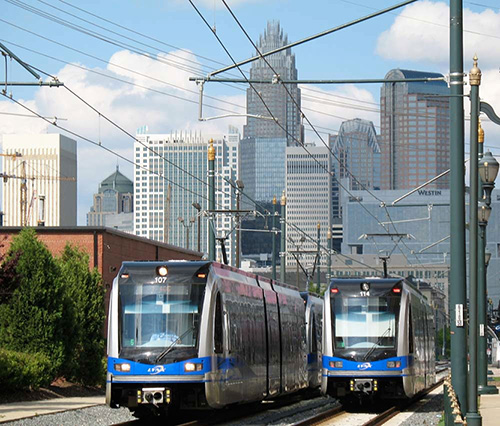 Photo of LYNX Blue Line light rail facing NE with Charlotte uptown in background