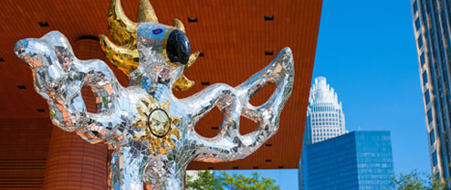 "Firebird" public art sculpture: a towering 3-D mirrored mosaic.